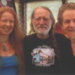These are the beautiful faces behind the Willie Nelson Peace Research Institute: Liz, Willie Nelson, and Jay.